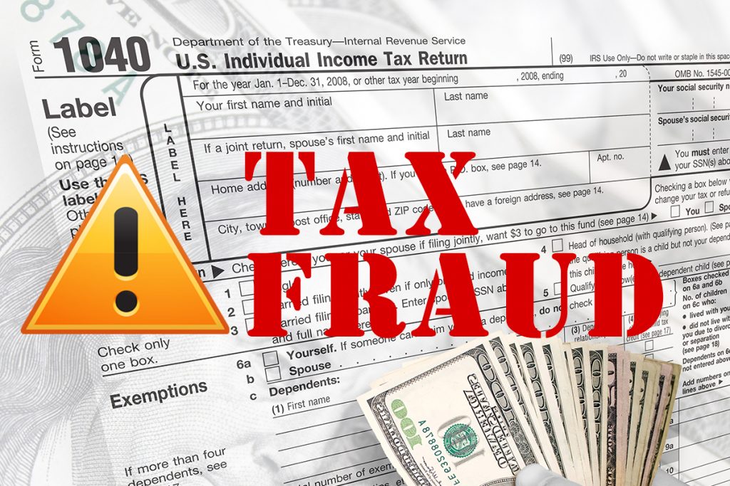 Tax Fraud in Red Letter above tax documents